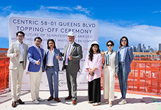 New Empire Corp. celebrates topping-off<br> of 131-unit Centric